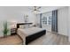 Spacious bedroom with king-size bed, ceiling fan, and large window at 18091 Eau Gallie Cir, Port Charlotte, FL 33948