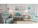 Living room with coastal decor and relaxing seating at 244 Saint Augustine # 303, Venice, FL 34285