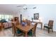 Bright dining room with wooden table and seating for six at 454 Cerromar Rd # 275, Venice, FL 34293