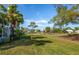 Landscaped grounds with a view of the golf course at 454 Cerromar Rd # 275, Venice, FL 34293