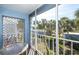 Screened balcony provides an outdoor space to relax and enjoy the view at 454 Cerromar Rd # 275, Venice, FL 34293