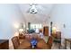 View of dining area and living room with vaulted ceilings at 454 Cerromar Rd # 275, Venice, FL 34293