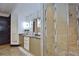 Bathroom features tile flooring, modern vanity and sink, and a glass-enclosed shower at 361 Benjamin Franklin Dr # A, Sarasota, FL 34236