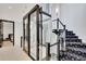 Home featuring an elevator for easy access between floors, complemented by a staircase with elegant design at 361 Benjamin Franklin Dr # A, Sarasota, FL 34236