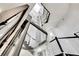 Modern home elevator features glass walls and an elevator shaft with a skylight at 361 Benjamin Franklin Dr # A, Sarasota, FL 34236