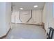 Large unfinished garage with white walls, concrete floors and fluorescent lighting at 361 Benjamin Franklin Dr # A, Sarasota, FL 34236