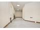 Spacious unfinished garage with white walls and a concrete floor at 361 Benjamin Franklin Dr # A, Sarasota, FL 34236