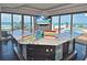 Ocean view kitchen featuring a marble countertop, breakfast bar, and beach views at 361 Benjamin Franklin Dr # A, Sarasota, FL 34236