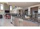 Spacious kitchen with modern stainless steel appliances, an island, and sleek countertops, perfect for cooking and entertaining at 361 Benjamin Franklin Dr # A, Sarasota, FL 34236