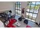 Spacious living area with tall windows, bright furnishings, and an open layout at 361 Benjamin Franklin Dr # A, Sarasota, FL 34236