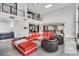 Open-concept living area with modern furniture, high ceilings, and views into the kitchen, perfect for entertaining at 361 Benjamin Franklin Dr # A, Sarasota, FL 34236