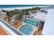 Rooftop deck features a uniquely designed set of pools with great views of the beach at 361 Benjamin Franklin Dr # A, Sarasota, FL 34236