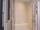 Modern shower with a built-in bench and multi-jet system offers a spa-like experience in a tiled enclosure at 361 Benjamin Franklin Dr # A, Sarasota, FL 34236