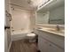 Bathroom with shower/tub combo, toilet, and single sink vanity at 266 Cerromar S Way # 55, Venice, FL 34293