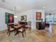 Spacious dining area with hardwood floors and large artwork at 205 Mestre Pl, North Venice, FL 34275