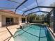 Relaxing screened pool and spa area at 205 Mestre Pl, North Venice, FL 34275