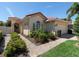 Single story home with tile roof, landscaped yard, and walkway at 205 Mestre Pl, North Venice, FL 34275