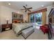 King-size bedroom with pool view, sliding doors, and ceiling fan at 205 Mestre Pl, North Venice, FL 34275