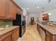 Bright kitchen with stainless steel appliances and an island at 205 Mestre Pl, North Venice, FL 34275