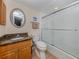 Clean bathroom with granite countertop and shower at 601 Shreve St # 51B, Punta Gorda, FL 33950