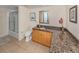 Bathroom features granite vanity, large mirror, and walk-in shower at 601 Shreve St # 51B, Punta Gorda, FL 33950