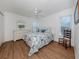 Cozy bedroom with a comfortable bed and dresser at 601 Shreve St # 51B, Punta Gorda, FL 33950