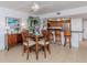 Spacious dining area with a wooden table and chairs at 601 Shreve St # 51B, Punta Gorda, FL 33950