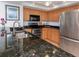 Modern kitchen featuring stainless steel appliances and granite countertops at 601 Shreve St # 51B, Punta Gorda, FL 33950