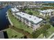 Aerial view of the community, showing buildings and canal at 601 Shreve St # 51B, Punta Gorda, FL 33950