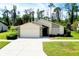 Image 1 of 62: 404 Cypress Forest Dr, Englewood