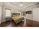 Spacious bedroom with hardwood floors and access to the pool at 2340 Bayshore Rd, Nokomis, FL 34275
