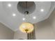Ornate chandelier with a detailed design and warm lighting at 2340 Bayshore Rd, Nokomis, FL 34275