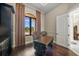 Bright home office with large window and hardwood floors at 2340 Bayshore Rd, Nokomis, FL 34275
