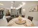 Open kitchen with an island and breakfast bar at 2340 Bayshore Rd, Nokomis, FL 34275