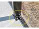 Close up on a bolted structural connector at the base of the pool screen frame at 1061 Owl Dr, Englewood, FL 34223
