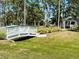 White gazebo with green roof near footbridge at 5220 Palena Blvd, North Port, FL 34287