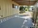 Covered carport with adjacent latticework fence at 5220 Palena Blvd, North Port, FL 34287