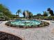 Ornamental fountain with dolphin statues at 5220 Palena Blvd, North Port, FL 34287