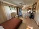 Cozy bedroom with a double bed and vintage dresser at 5220 Palena Blvd, North Port, FL 34287