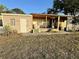 Mobile home with covered patio and spacious yard at 5220 Palena Blvd, North Port, FL 34287