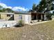 View of mobile home with shed and covered patio at 5220 Palena Blvd, North Port, FL 34287