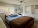 Relaxing bedroom with a double bed and a ceiling fan at 5220 Palena Blvd, North Port, FL 34287