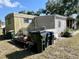Mobile home with detached shed and garden area at 5220 Palena Blvd, North Port, FL 34287
