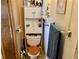 Small bathroom with a toilet and a storage cabinet at 5220 Palena Blvd, North Port, FL 34287
