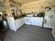 Kitchen with dishwasher, stove, refrigerator and cabinets at 5220 Palena Blvd, North Port, FL 34287