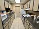 Well-equipped kitchen featuring modern appliances and ample cabinetry at 5220 Palena Blvd, North Port, FL 34287