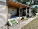 Covered patio with seating area and screened enclosure at 5220 Palena Blvd, North Port, FL 34287