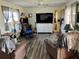 Spacious living room with hardwood floors and comfy seating at 5220 Palena Blvd, North Port, FL 34287