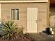 Mobile home exterior with a shed and landscaping at 5220 Palena Blvd, North Port, FL 34287