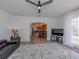 Open concept living room with view of kitchen and pool at 14462 Fort Worth Cir, Port Charlotte, FL 33981